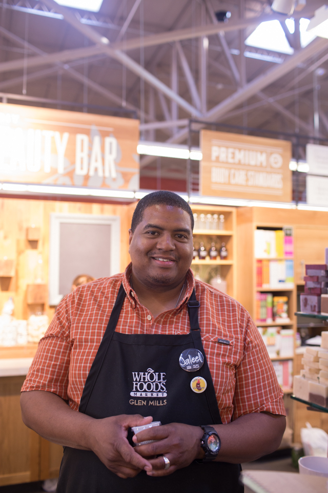 Jaleel McFadden says that he likes working for Whole Foods because he feels a connection with the customers and products there. Credit: Tricia Burrough/Lilac Blossom Photography.