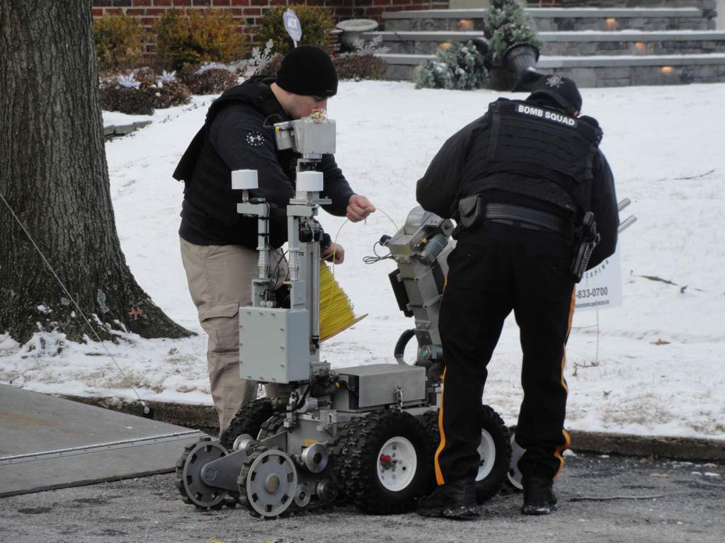 Camden County Bomb Unit officers prepare a tactical robot. Credit: Matt Skoufalos.