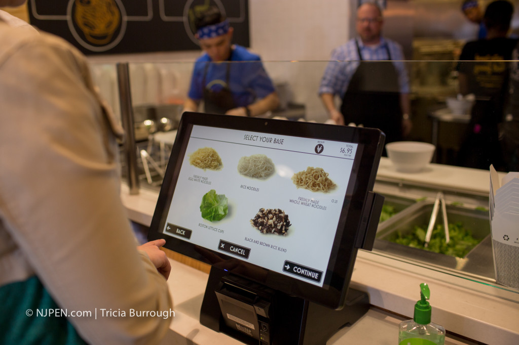 Touchscreen ordering at Honeygrow Cherry Hill. Credit: Tricia Burrough.